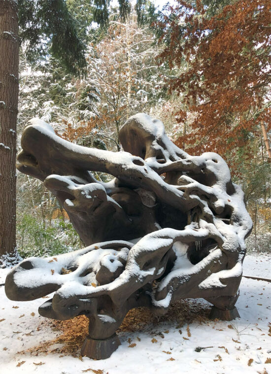 Woodwave sculpture with snow